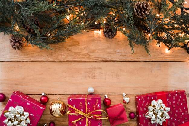 Green branches with small gift boxes 