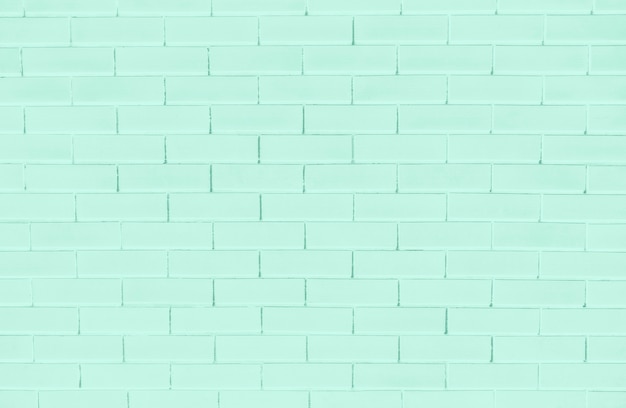 Free photo green brick wall textured background