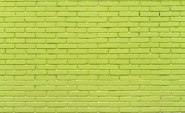 Зеленый кирпичная стена