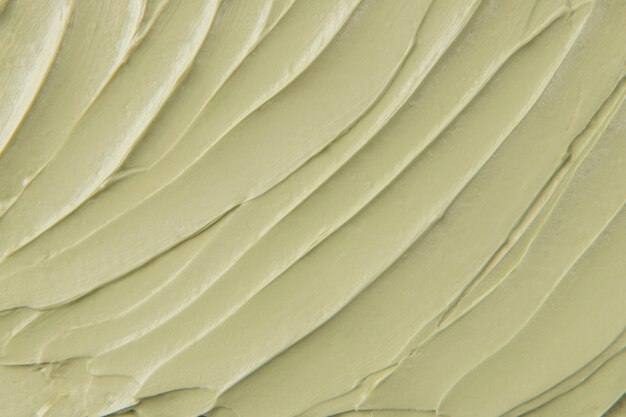 Green Cake frosting texture background close-up