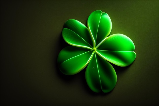 Free photo a green clover with four leaves on a dark background.