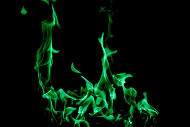 Green fire burning on black