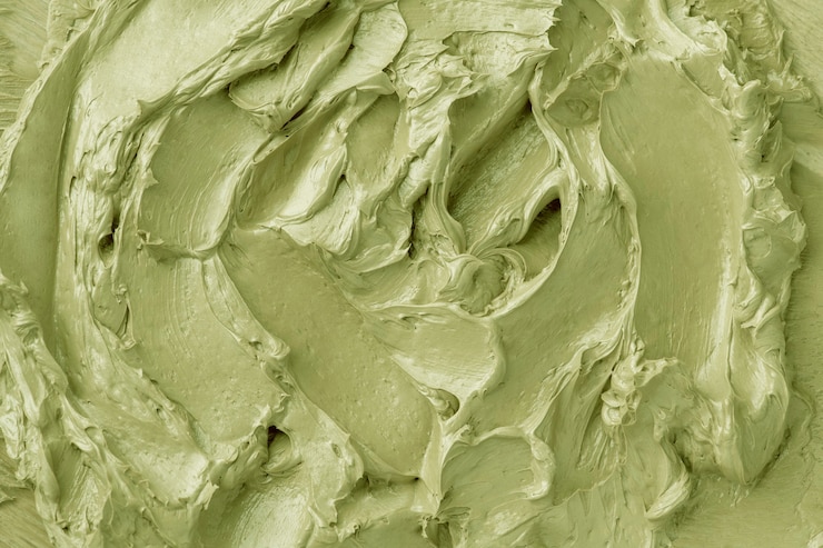 Free Photo green frosting texture background close-up