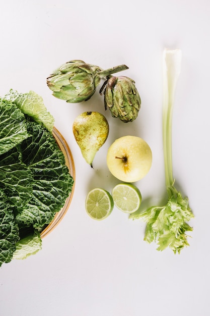 Green fruits and vegetables composition