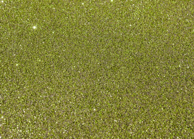Green glittery texture background abstract