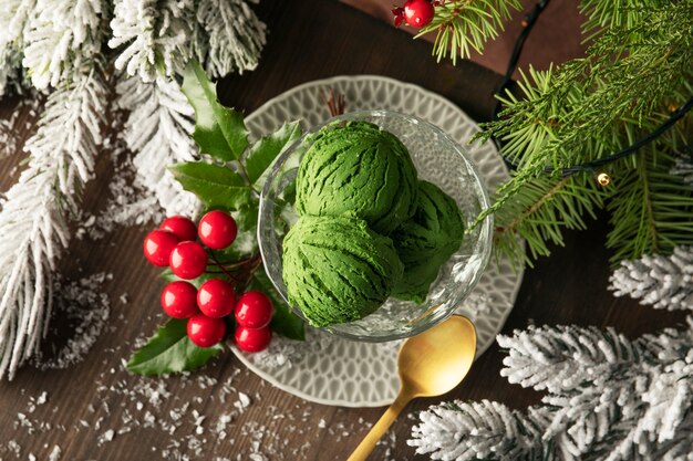 Green ice cream in cup top view