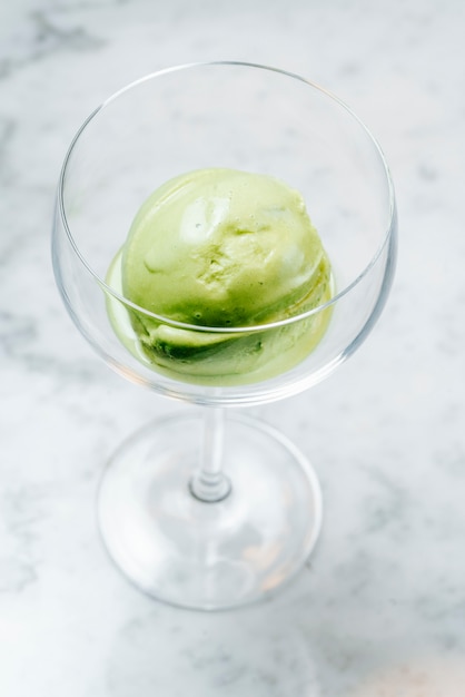 Green ice cream served in glass