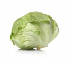 Free photo green lettuce on a white surface