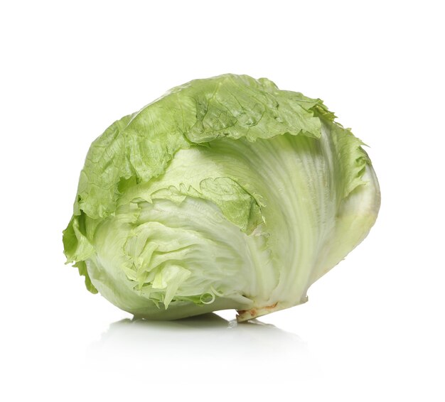 Green lettuce on a white surface