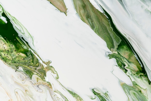 Free photo green liquid marble background abstract flowing texture experimental art