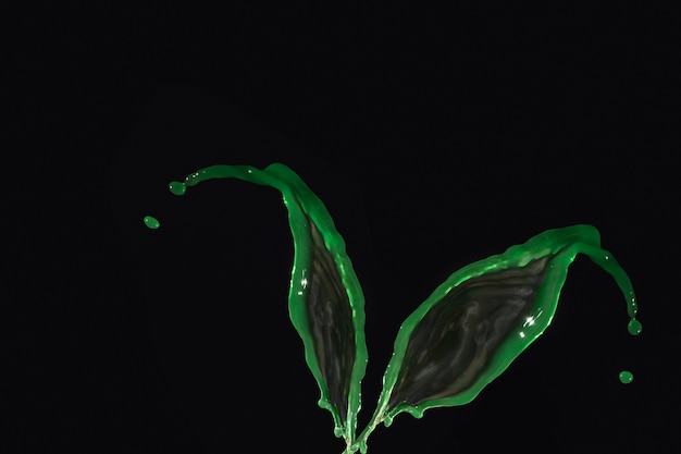 Green liquid representing leaf on black background