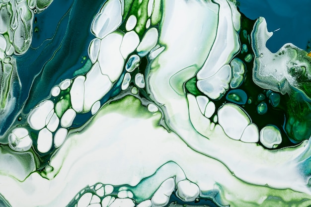 緑の大理石の渦巻き模様の背景DIY流れるテクスチャ実験アート
