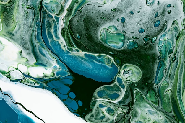 Free photo green marble swirl background diy flowing texture experimental art