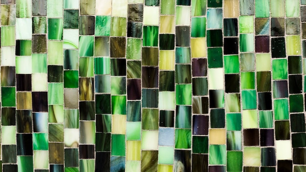 Бесплатное фото Зеленая мозаика из плитки формирует текстуру