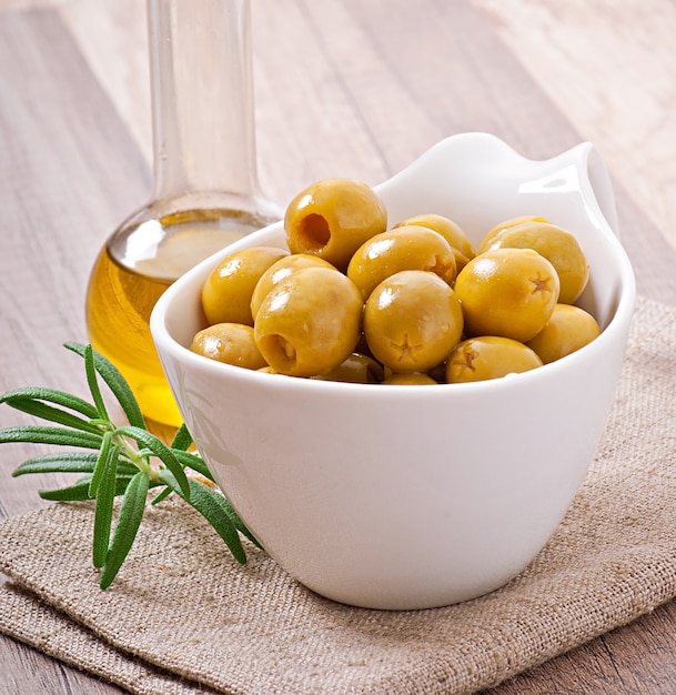 Green olives in bowl.