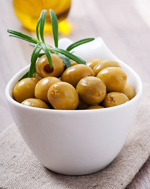 Green olives in bowl.
