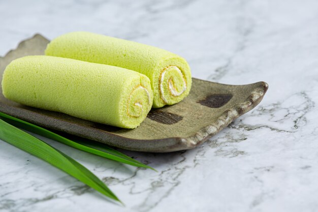 green pandan roll cake ready to eat