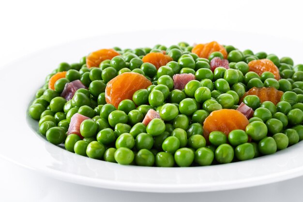 Green peas with serrano ham and carrot