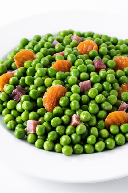 Green peas with serrano ham and carrot