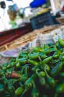 Free photo green peppers in a market in india