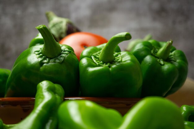 Green peppers , tomatoes and eggplant