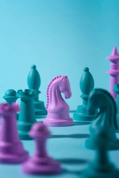 Green and pink chess pieces