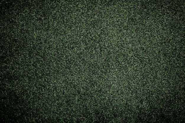Green plastic grass textured backdrop
