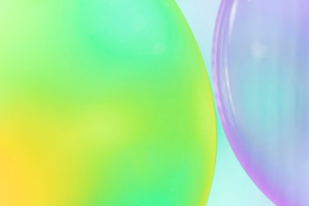 Free photo green purple and blue abstract background with bubbles