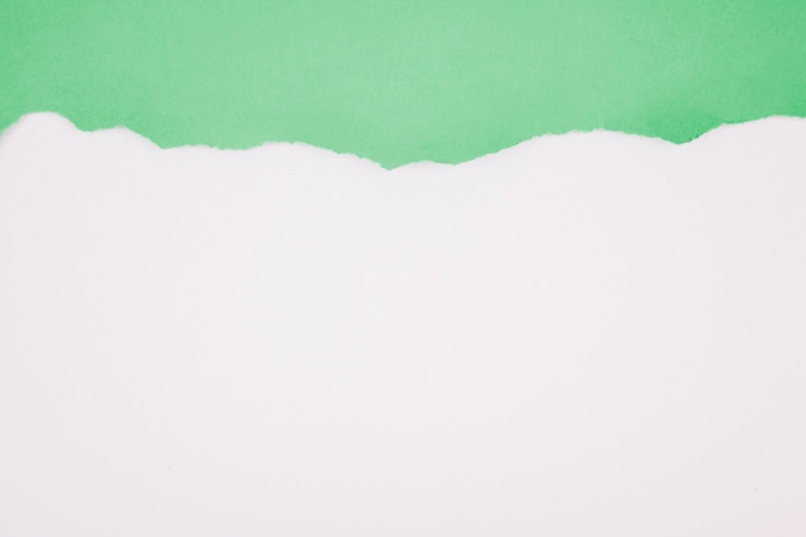 Free Photo green ragged paper on white