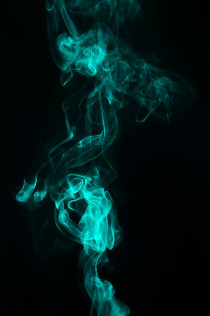 Green smoke seamless texture on black background