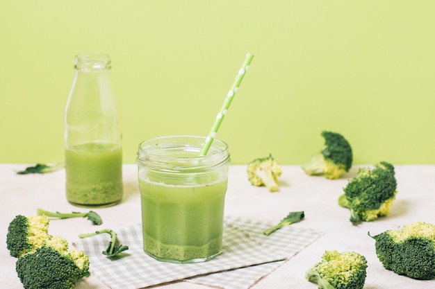 Green smoothie next to broccoli