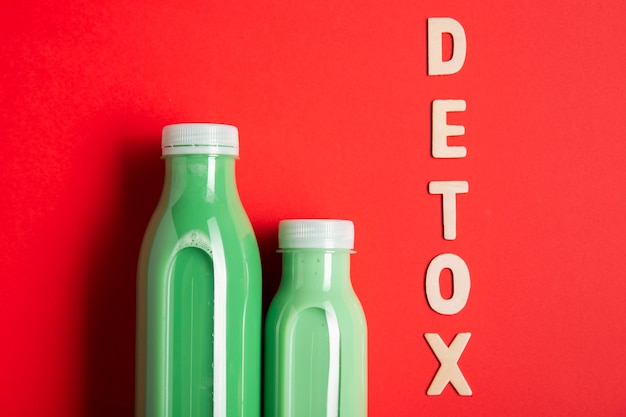 Green smoothies with detox lettering