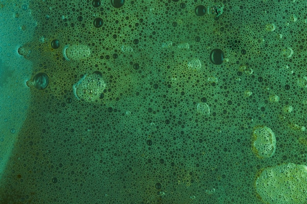 Free photo green soapy water with blobs