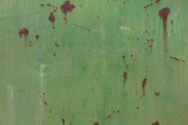 Green stained metal wall