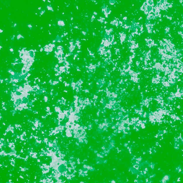 Green stained textured wall background