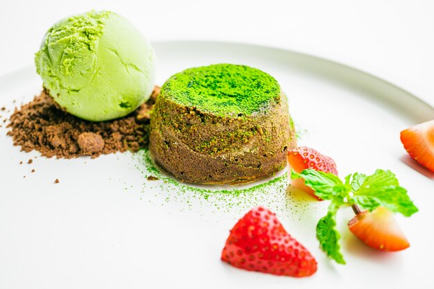 Green tea chocolate lava with ice cream and strawberry