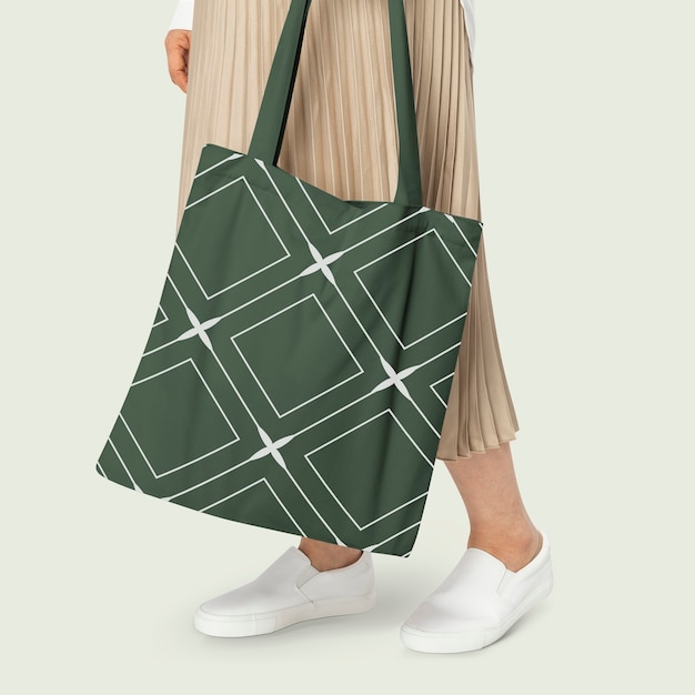 Foto gratuita borsa tote verde con motivo a rombi per abbigliamento di base