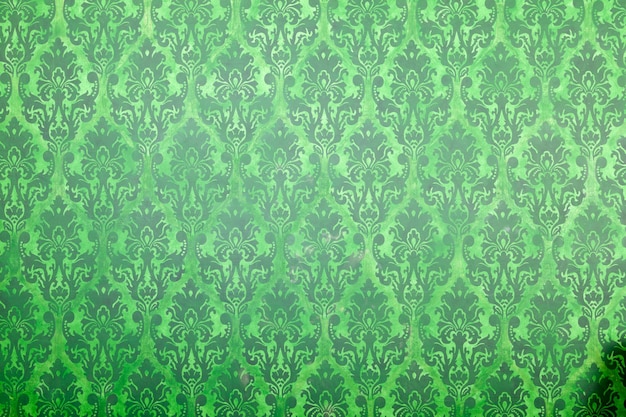 無料写真 古い壁に緑のビンテージパターン。リッチなヴィンテージレトロパターンインテリア