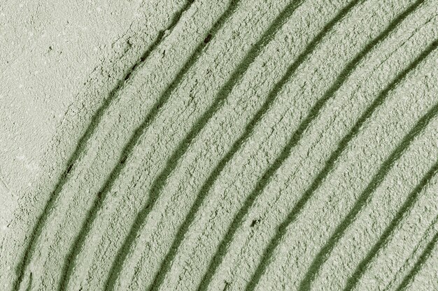 緑の壁のペンキの織り目加工の背景