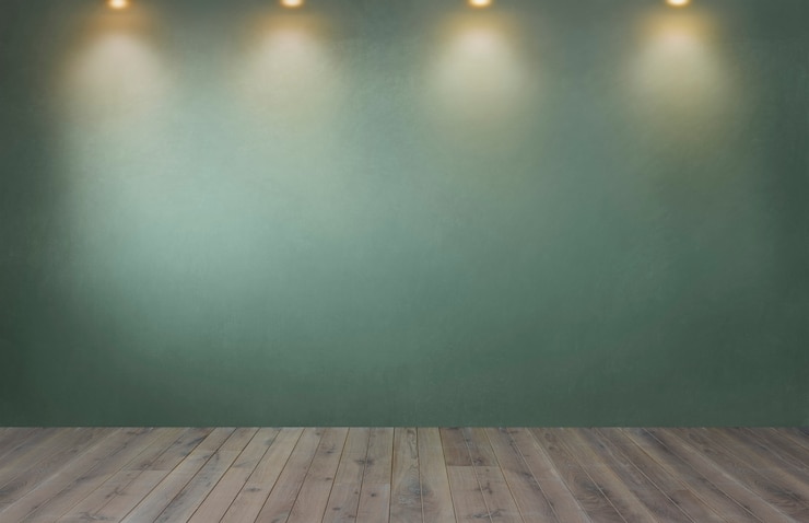 Free Photo green wall with a row of spotlights in an empty room