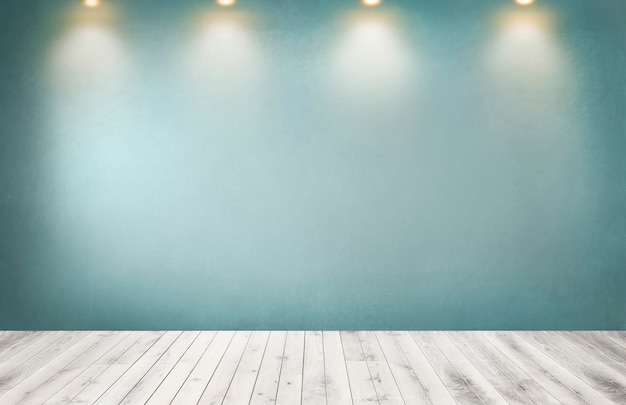 Foto gratuita parete verde con una fila di faretti in una stanza vuota