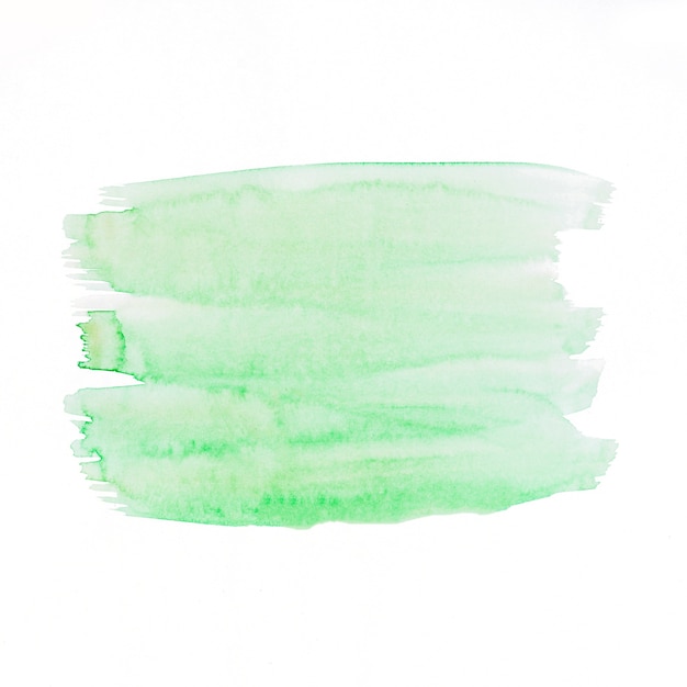 Зеленая акварель кисти на белом фоне