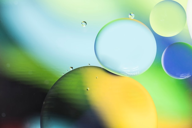 Green yellow and blue abstract background with bubbles