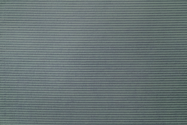 Greenish gray corduroy fabric textured background