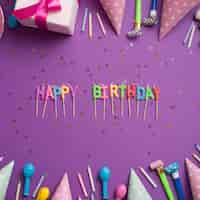 Free photo greeting words surrounded by birthday elements