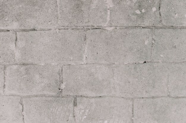 Grey grunge brick wall background