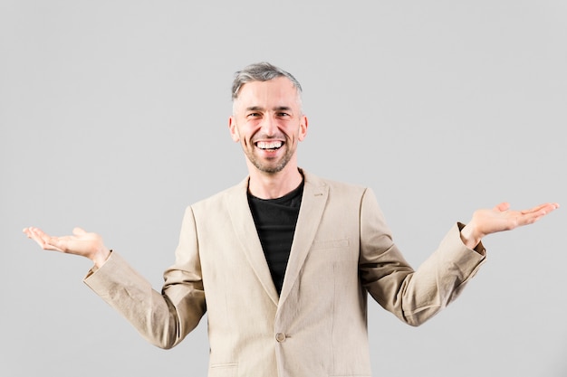 Free photo grey-haired male fooling around