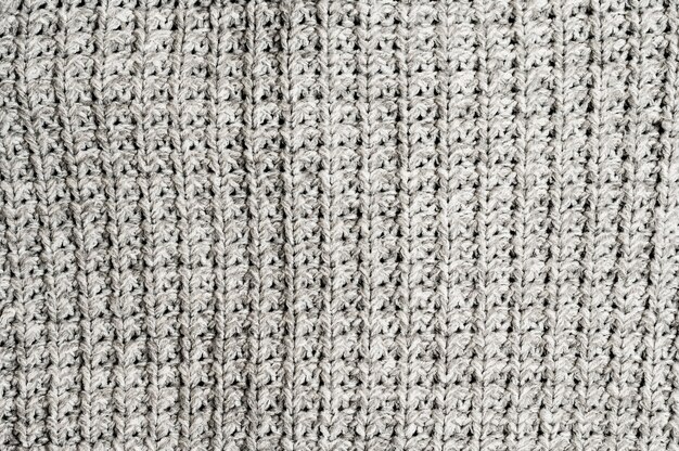 Grey knitted fabric background