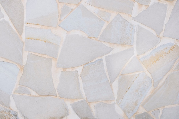 Grey stones with white cement for background