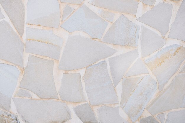 Серые камни с белым цементом для фона